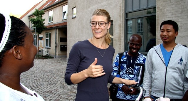 Danish MP Ane Halsboe-Jørgensen discusses democracy with course participants outside Danida Fellowship Centre at Frederiksberg.